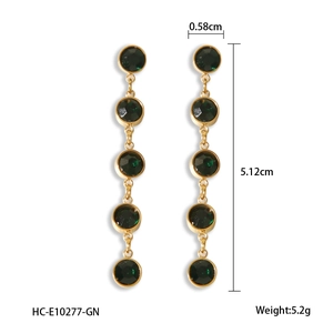 Detailed view of 18K gold plated drop earrings with green stones and dimensions