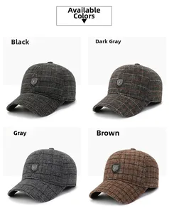 Detail view of plaid baseball caps in black, dark grey, grey, and brown with 'F' logo