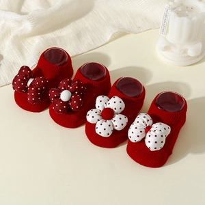 Red baby non-slip floor socks with polka dot bows and floral knit details