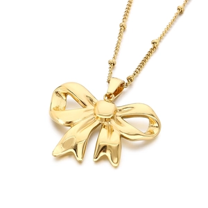 Elegant gold-tone hollow bow pendant necklace for women in minimalist stainless steel finish