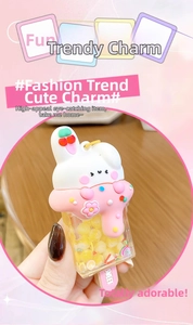Detailed view of sweet rabbit ice cream keychain with pink cream and sprinkles