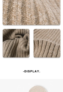 Close-up of khaki chunky knit wool hat texture showing thick warm weaving detail