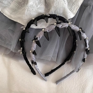 Ballet style headband with rhinestones, bows and studs in black and grey-purple colors