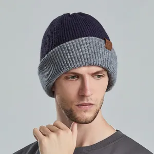 Minimalist two-tone knitted beanie in purple and grey with premium leather patch for winter