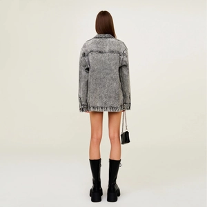 Back view of a long oversized washed grey denim jacket with vintage snow wash texture