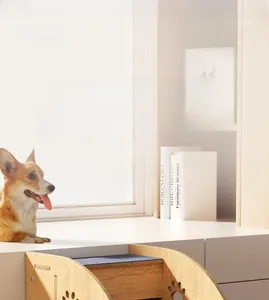 Detail of wooden pet ramp with gray non-slip felt mat and paw cutout decoration