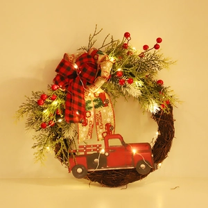 Christmas wreath with vintage red truck, pine needles, LED lights and Merry Christmas ribbon