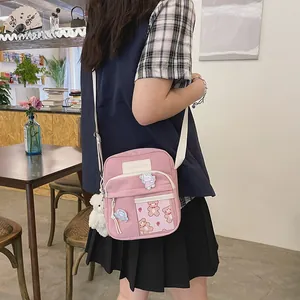 Sac bandoulière rose dessin animé avec poche transparente, fenêtre ours et peluche déco