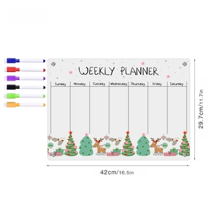 Macro detail of Christmas acrylic weekly planner with six colored dry erase markers