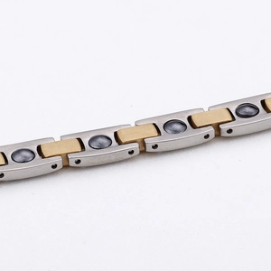 Two-tone titanium steel magnetic bracelet for men with silver and gold links and therapy stones
