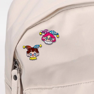 Cute cartoon clown enamel pins set on a canvas bag, creative metal lapel badges for accessories