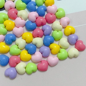 Colorful glossy heart-shaped resin beads in pastel macaron colors for DIY accessories