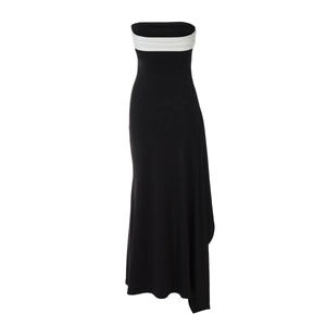 Detail showing high-contrast black and white strapless split dress with waist contouring