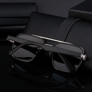Detail of polarized lenses and black silver metal frame on premium mens sunglasses