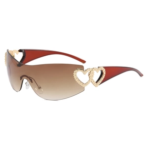 Y2K rimless heart sunglasses with gradient brown lenses and gold cutout metal accents