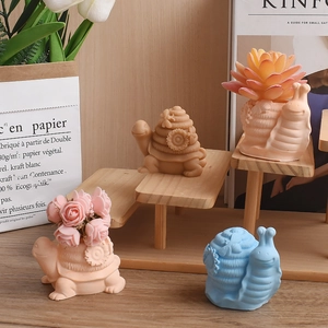 3D snail and turtle succulent planter pots made of matte resin for office desk decor