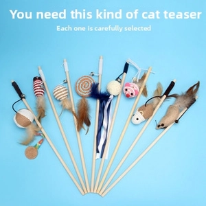 Detailed close-up of interactive wooden cat wands with feathers, bells, and linen mice toys