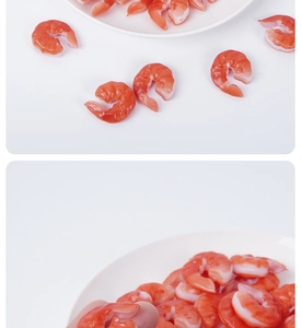 Detailed view of realistic PVC shrimp models with realistic texture and orange color