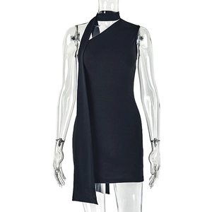 Detail of black one-shoulder mini dress with neck strap and slim fit tailoring