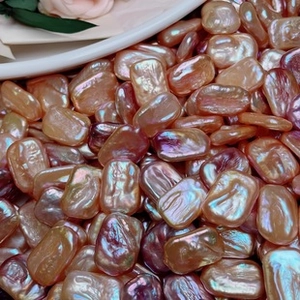 Detail of colorful freshwater baroque pearls showing natural textures and luster
