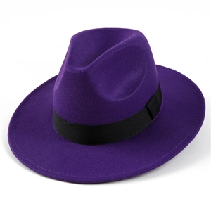 Detail view of purple wool fedora hat with a black ribbon band from a 45-degree angle