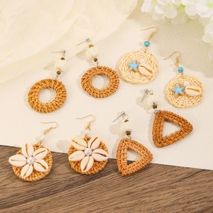 Bohemian rattan earrings with shells and starfish accents for a beach holiday look