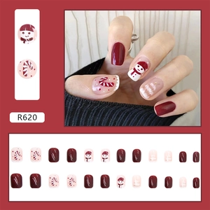 Short wine red Christmas press-on nails featuring cute snowman and candy cane art details