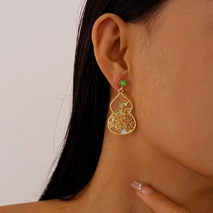 Elegant Chinese style gourd earrings with green gems and gold hollow metal design