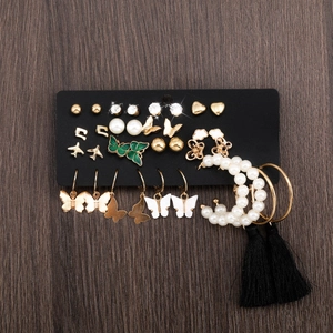 17-piece alloy earring set featuring butterfly, star, and pearl studs on black card