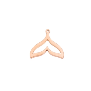 Macro detail of rose gold hollow mermaid tail pendant with polished mirror finish
