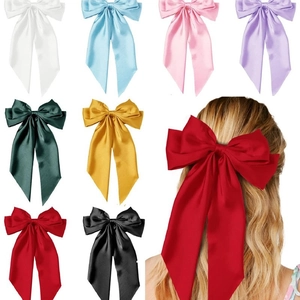 Elegant large satin bow hair clip with long ribbons in multiple colors for women