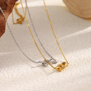 Modern 18K gold plated knotted pendant necklace shown at 45-degree angle in two colors