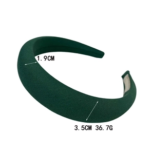 Green padded sponge headband in textured fabric, 3.5cm wide and 1.9cm thick accessory