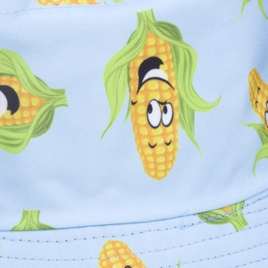 Light blue reversible sun hat featuring a cute yellow cartoon corn pattern all over