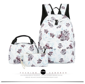 Three-piece floral backpack set including lunch bag and pencil case with rose print
