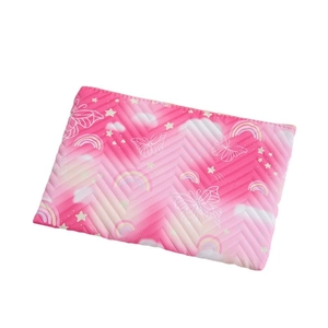 Pink gradient cosmetic bag with butterfly and star patterns featuring quilted texture