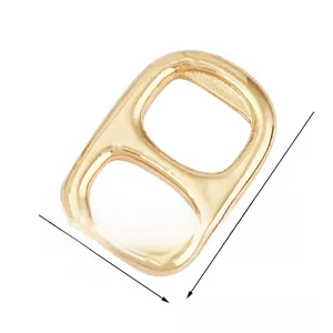 Detailed view of golden metal soda tab pendant with 16mm x 23mm size dimensions