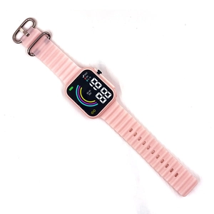 Detailed top view of pink digital sports watch with ripple silicone strap and LED display