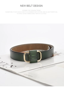 Close-up of a dark green genuine leather belt with a gold rectangular pin buckle on a magazine