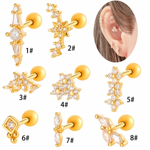 Set of 8 gold flower and star cartilage earrings with zircon stones and screw ball back