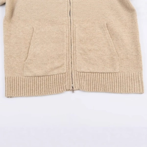 Beige hooded knit jacket with zipper and dual front pockets for a casual autumn style