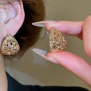 French vintage champagne gold hollow teardrop earrings with sparkling crystals