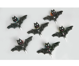 Detail of Halloween bat lollipop decorative cards with cute cartoon eyes and red smiles