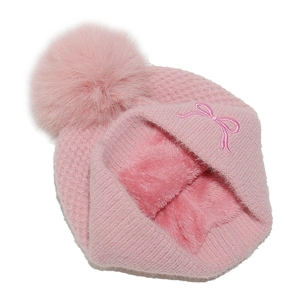 Detail of pink knit beanie showing thick fleece lining and embroidered bow decoration