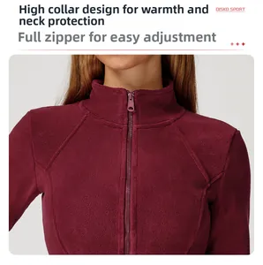 Detail of high neck burgundy fleece jacket with high-quality zipper closure for women