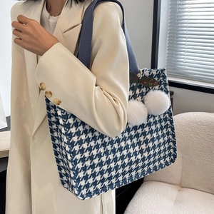 Blue houndstooth canvas tote bag with cherry pom-pom charm and deep blue shoulder strap