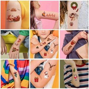 Cartoon Christmas temporary tattoos for kids featuring Santa Claus and reindeer designs