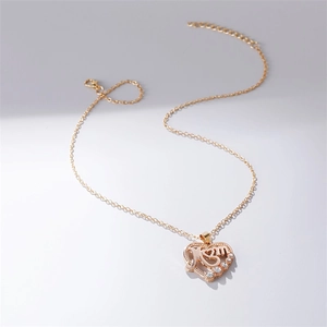 Detailed view of gold MOM heart pendant with crystals and adjustable lobster clasp chain