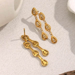 Detail shot of 18K gold plated teardrop earrings with sparkling cubic zirconia inlays
