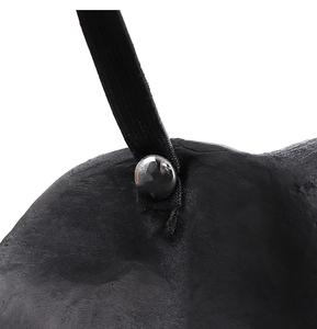 Detail shot of black textured PU foam mask with silver metal rivet and elastic band